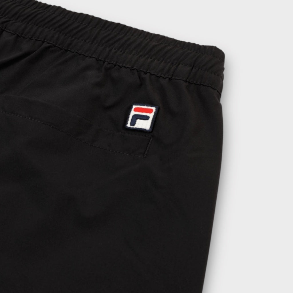 FILA High Tide Relaxed 4-way Stretch Trousers I Sort